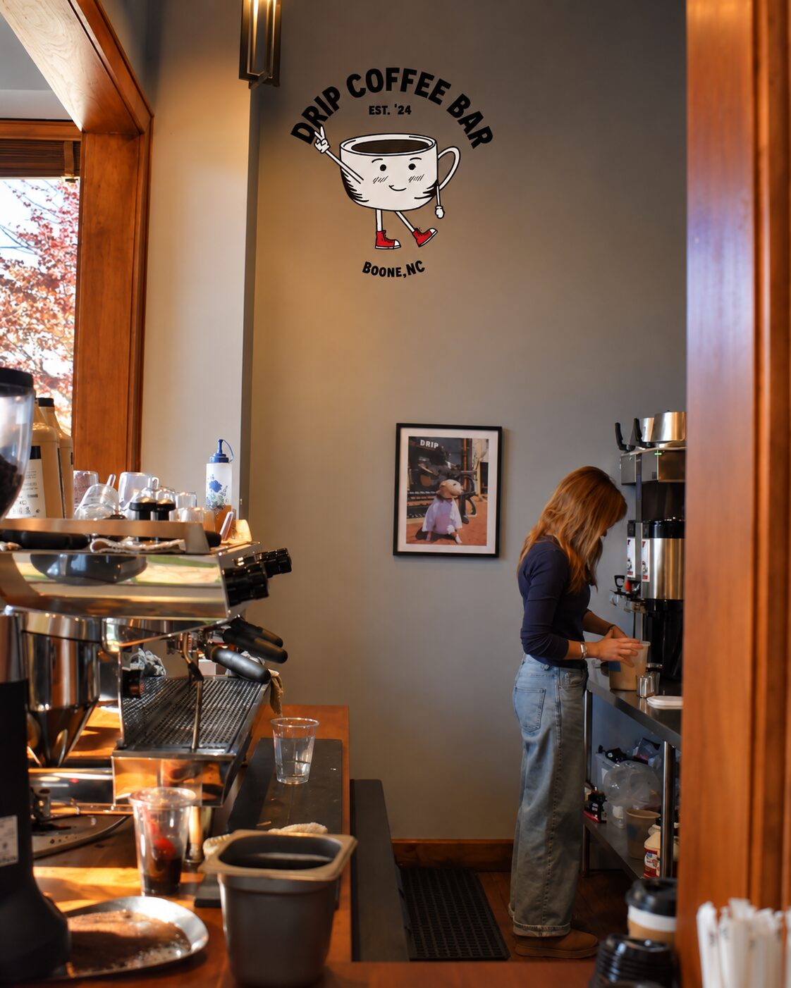 Barista preparing drinks at the espresso machine