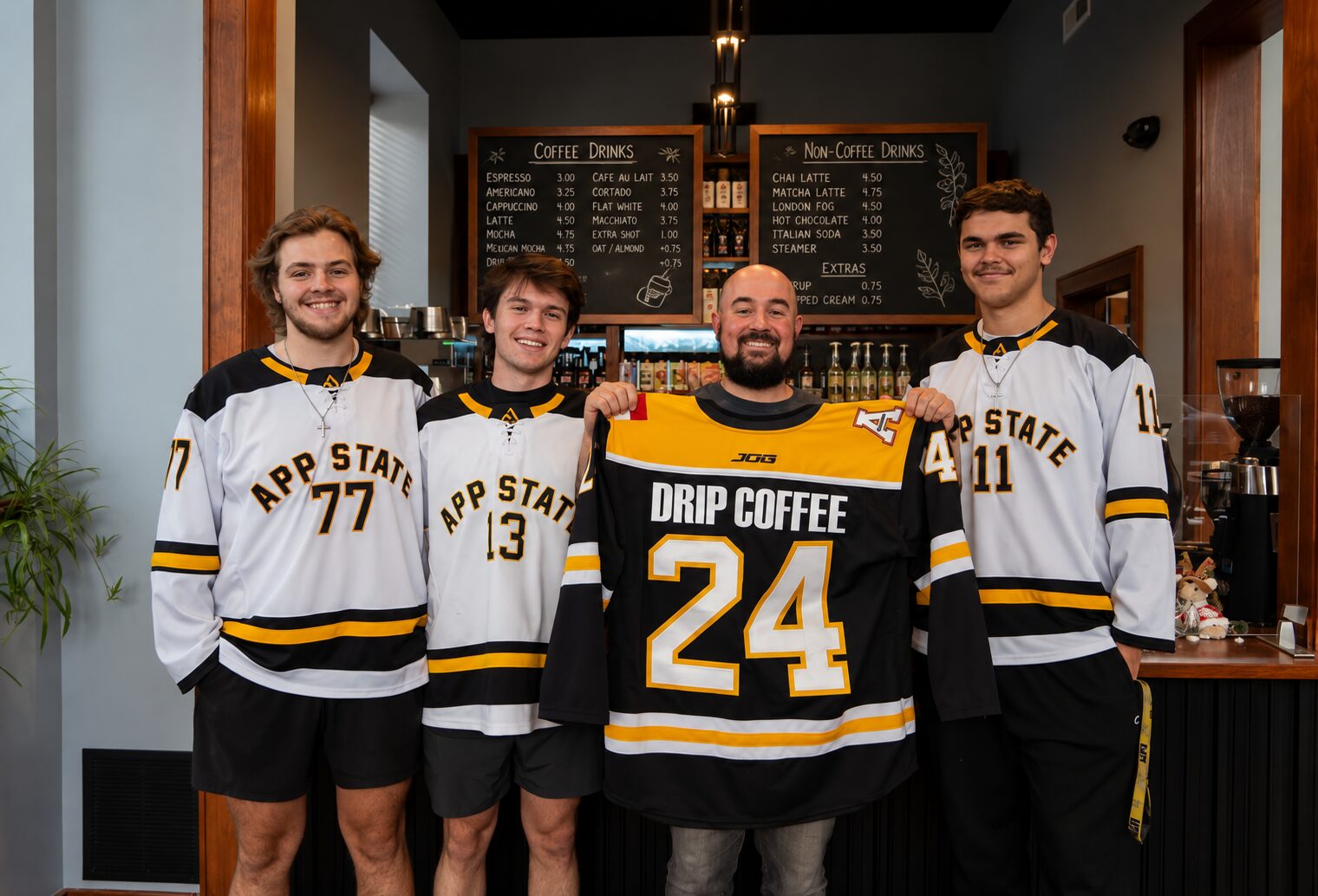 App State Hockey players at Drip Coffee Bar holding a Drip Coffee jersey
